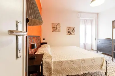 Letto o letti in una camera di La perla sul mare, Levanto