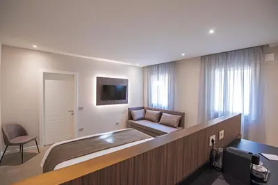 TV o dispositivi per l'intrattenimento presso Modena Relax Luxury Rent Rooms