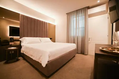 Letto o letti in una camera di Modena Relax Luxury Rent Rooms