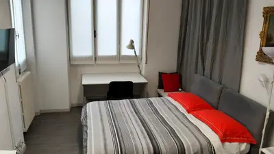 Letto o letti in una camera di Villa Laila