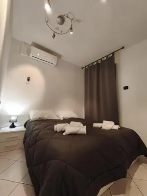 Letto o letti in una camera di Atmosphere Guest House Rubiera