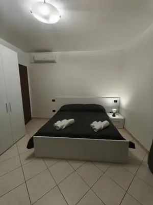 Letto o letti in una camera di Atmosphere Guest House Rubiera