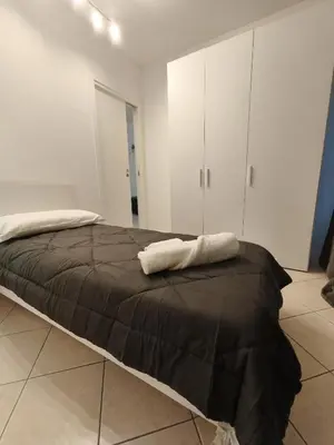 Letto o letti in una camera di Atmosphere Guest House Rubiera