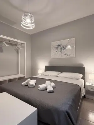 Letto o letti in una camera di SNG Home Crema