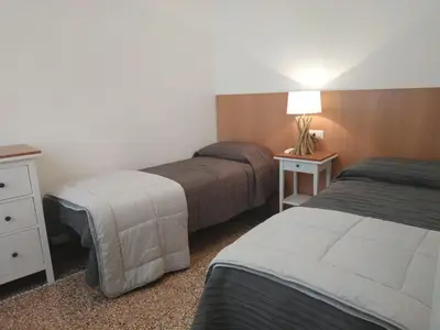 Letto o letti in una camera di La Triglia