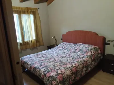Letto o letti in una camera di Casa Nonni