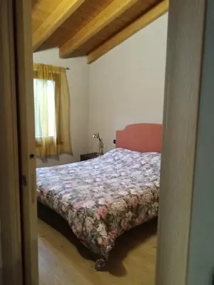 Letto o letti in una camera di Casa Nonni
