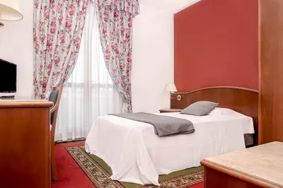Letto o letti in una camera di Hotel Poli
