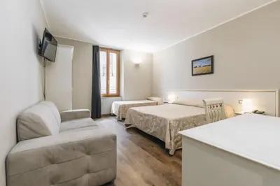 Letto o letti in una camera di Hotel Astoria