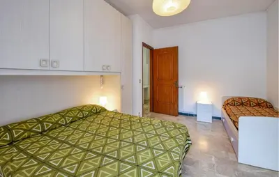 Letto o letti in una camera di 2 Bedroom Lovely Apartment In Moneglia