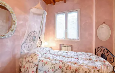 Letto o letti in una camera di Piccole Donne