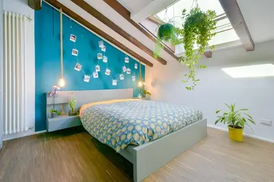 Letto o letti in una camera di Botanical Apartments Modena