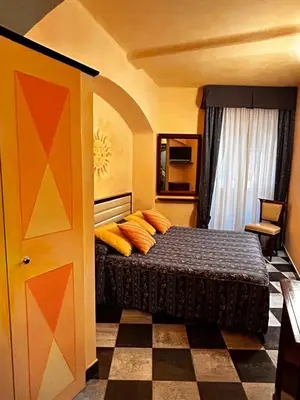Letto o letti in una camera di La Poesia Apartment
