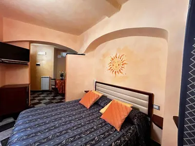 Letto o letti in una camera di La Poesia Apartment