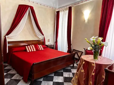 Letto o letti in una camera di Giglio Rosso Suite
