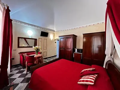 Letto o letti in una camera di Giglio Rosso Suite