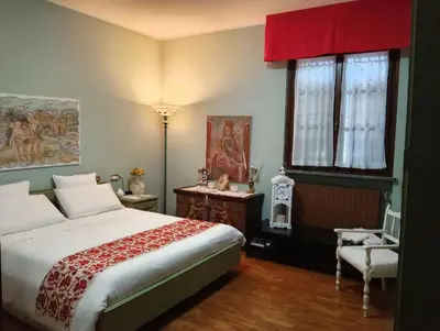 Letto o letti in una camera di B&B La Casa di Rita