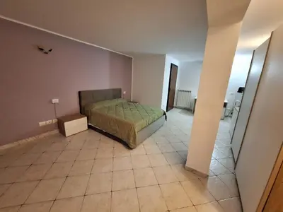 Letto o letti in una camera di Affittacamere Le Rondini 18