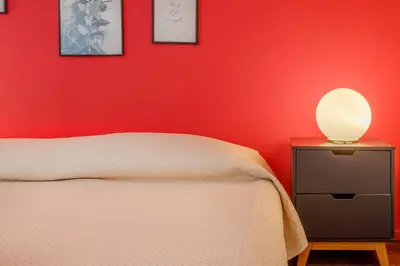 Letto o letti in una camera di Ghirlandina Loft - In the Historic Center of Modena
