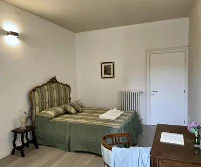 Letto o letti in una camera di Inn Borromeo - Pavia City - by HOST4U