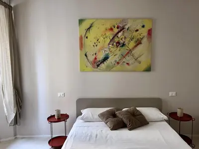 Letto o letti in una camera di San Martino Suite - Pavia City - by HOST4U