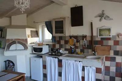 Cucina o angolo cottura di Lo Chalet sul Golfo
