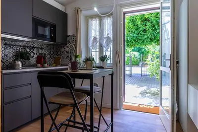 Cucina o angolo cottura di RELAX - Casa a 2 Passi dal Centro con Free Parking e WiFi