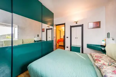 Letto o letti in una camera di 5 Terre Shuttle Villa Maremonti with Pool 8guests