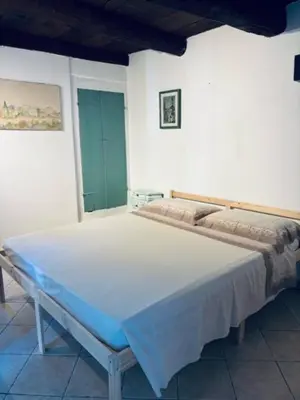 Letto o letti in una camera di Al Castello