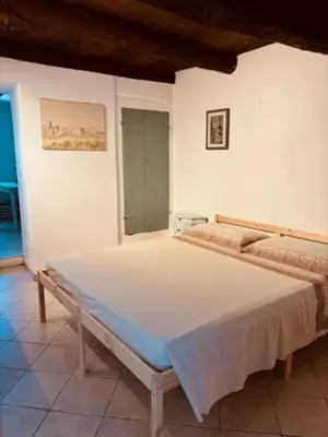 Letto o letti in una camera di Al Castello