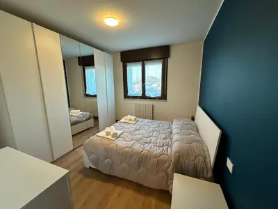 Letto o letti in una camera di Relax nel cuore dell Emilia AlloggiaRE vicino autostrada e RCF Arena
