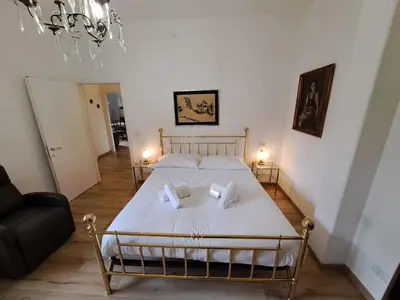 Letto o letti in una camera di FuoriPorta Affitti Brevi - The Cesare