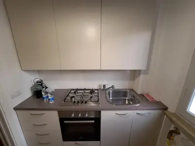 Cucina o angolo cottura di FuoriPorta Affitti Brevi - The Cesare