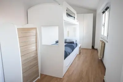 Letto o letti in una camera di Tornolo, 5 Stelle - Alloggio Elegante