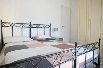 Letto o letti in una camera di Tornolo, 5 Stelle - Alloggio Elegante
