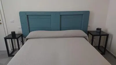 Letto o letti in una camera di Piccolo Bacco dei Quaroni