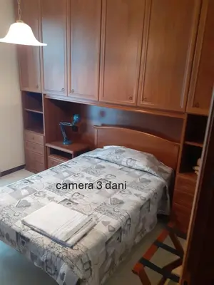 Letto o letti in una camera di Locanda Primo Sole