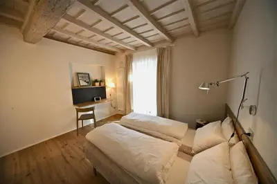 Letto o letti in una camera di 32 BnB Camerecaffè