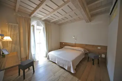 Letto o letti in una camera di 32 BnB Camerecaffè