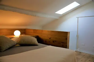 Letto o letti in una camera di 32 BnB Camerecaffè