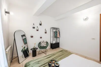 Letto o letti in una camera di Casa del Fotografo, a due passi dall'accademia