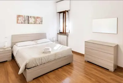 Letto o letti in una camera di Casa Emma