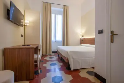 Letto o letti in una camera di Hotel Palace
