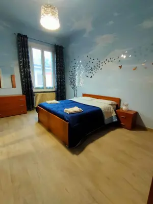 Letto o letti in una camera di Casa gialla