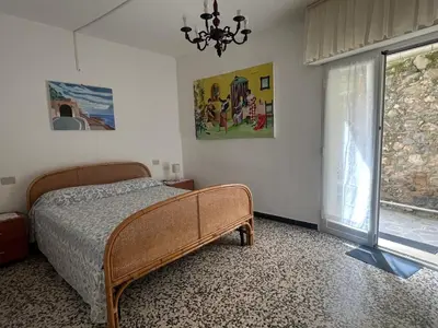 Letto o letti in una camera di Piano terra con giardino