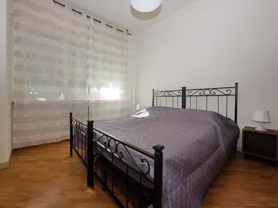 Letto o letti in una camera di Aurora Rooms