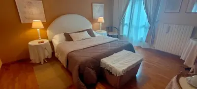 Letto o letti in una camera di B&B Rossorubino