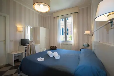 Letto o letti in una camera di Hotel Nazionale