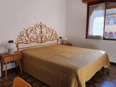 Letto o letti in una camera di Villa Paradiso