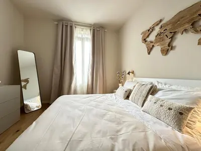 Letto o letti in una camera di Trilocale, 2 camere da letto, parcheggio gratuito